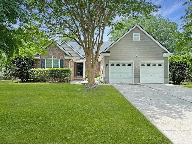 1317 Wild Olive Dr, Mount Pleasant, SC 29464 - view of front facade featuring concrete driveway, a front yard, brick siding, and an attached garage