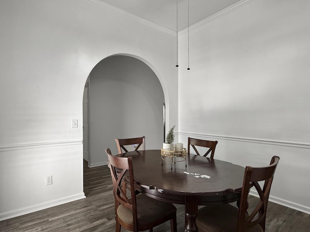1317 Wild Olive Dr, Mount Pleasant, SC 29464 - dining space featuring arched walkways, wood finished floors, baseboards, and ornamental molding