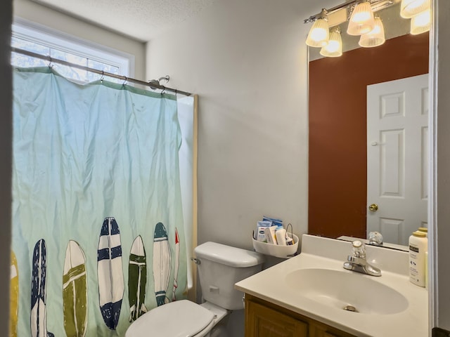 1317 Wild Olive Dr, Mount Pleasant, SC 29464 - full bath with vanity, curtained shower, toilet, and a textured ceiling