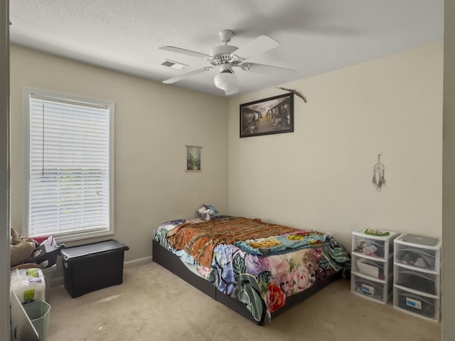 1317 Wild Olive Dr, Mount Pleasant, SC 29464 - carpeted bedroom with multiple windows and a ceiling fan