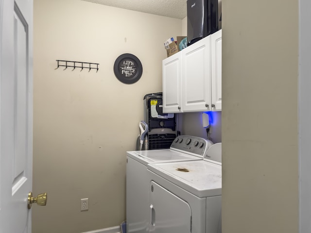 1317 Wild Olive Dr, Mount Pleasant, SC 29464 - laundry room with cabinet space, independent washer and dryer, and a textured ceiling