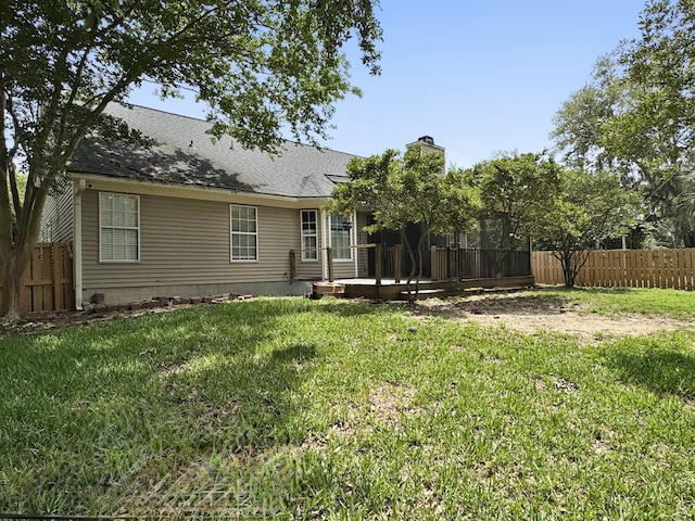 1317 Wild Olive Dr, Mount Pleasant, SC 29464 - back of house featuring a chimney and roof with shingles