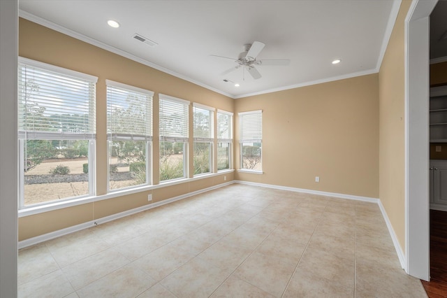 tiled spare room with crown molding and ceiling fan