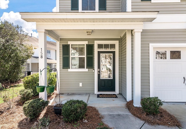 entrance to property with covered porch