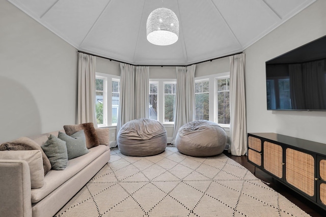 sitting room with lofted ceiling and light hardwood / wood-style floors