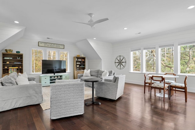 living room with ceiling fan, a healthy amount of sunlight, and dark hardwood / wood-style floors