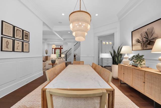 dining space featuring beam ceiling, coffered ceiling, a notable chandelier, ornamental molding, and dark hardwood / wood-style flooring