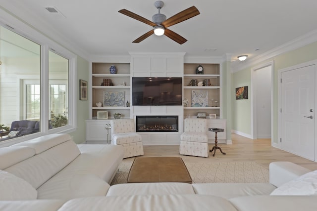 1216 Rivers Reach Dr, Charleston, SC 29492 - living area with ceiling fan, ornamental molding, light wood finished floors, a large fireplace, and built in features