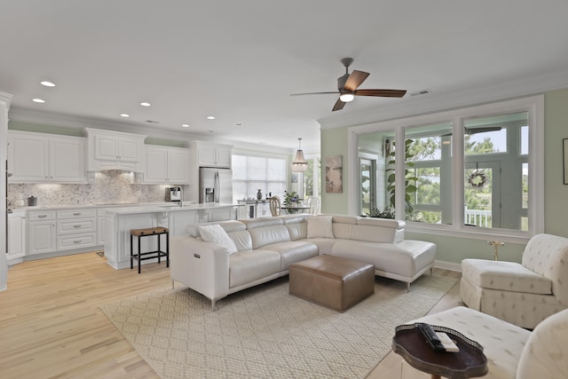 1216 Rivers Reach Dr, Charleston, SC 29492 - living room with crown molding, light wood finished floors, ceiling fan, and recessed lighting