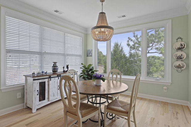 1216 Rivers Reach Dr, Charleston, SC 29492 - dining room featuring light wood finished floors, baseboards, a chandelier, and ornamental molding