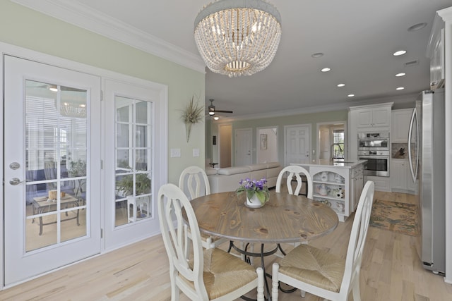 1216 Rivers Reach Dr, Charleston, SC 29492 - dining area with light wood-type flooring, crown molding, a chandelier, and recessed lighting