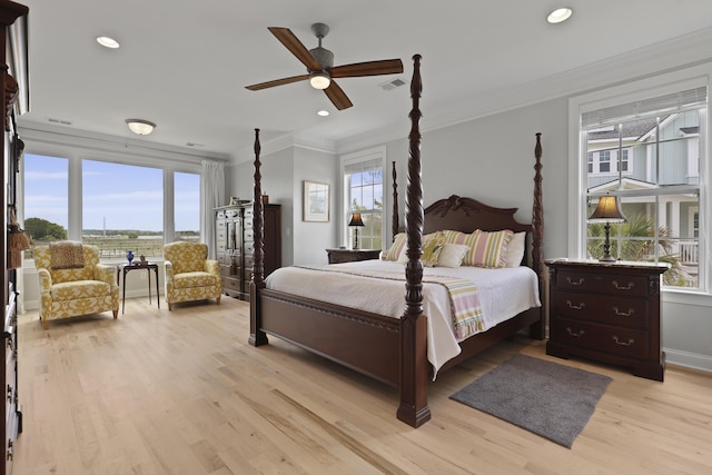 1216 Rivers Reach Dr, Charleston, SC 29492 - bedroom with crown molding, light wood-type flooring, recessed lighting, ceiling fan, and baseboards
