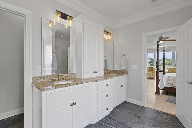 1216 Rivers Reach Dr, Charleston, SC 29492 - bathroom featuring double vanity, baseboards, crown molding, a stall shower, and ensuite bathroom