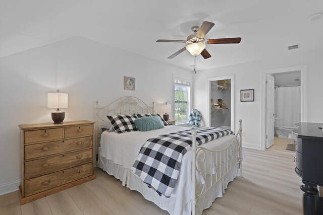 1216 Rivers Reach Dr, Charleston, SC 29492 - bedroom featuring a walk in closet, light wood finished floors, a closet, and ceiling fan