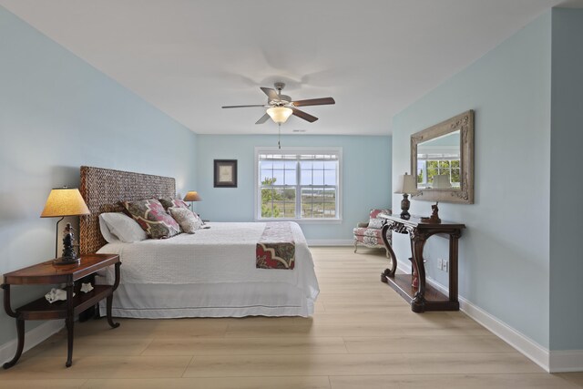 1216 Rivers Reach Dr, Charleston, SC 29492 - bedroom with light wood-style flooring, baseboards, and a ceiling fan