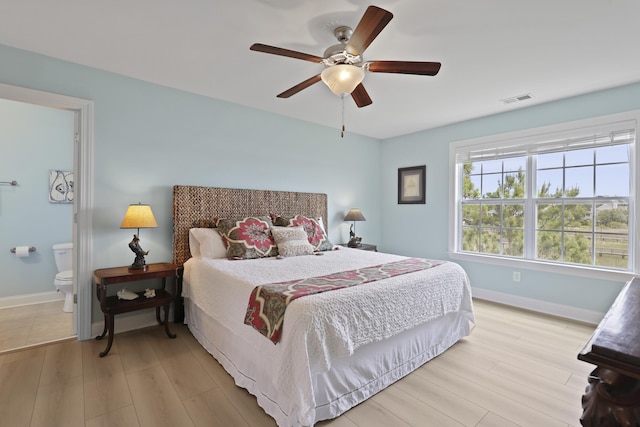 1216 Rivers Reach Dr, Charleston, SC 29492 - bedroom featuring wood finished floors, baseboards, a ceiling fan, and ensuite bath