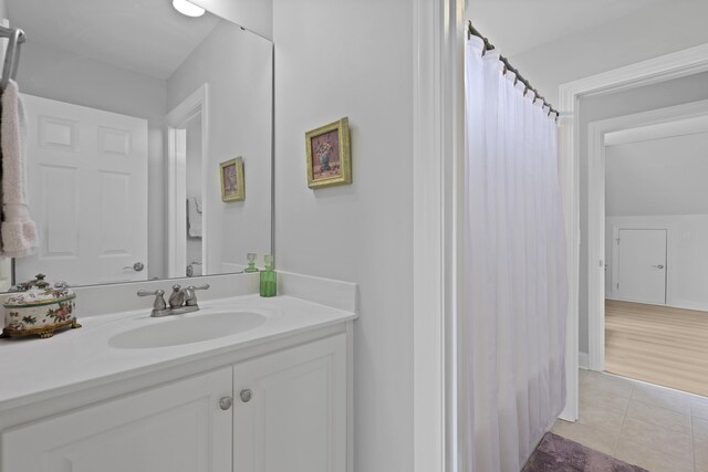 1216 Rivers Reach Dr, Charleston, SC 29492 - bathroom featuring vanity, tile patterned flooring, and curtained shower