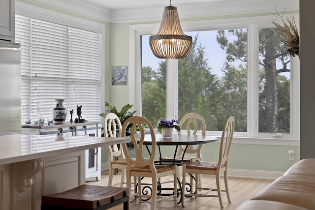 1216 Rivers Reach Dr, Charleston, SC 29492 - dining area featuring a chandelier, light wood-style flooring, and healthy amount of natural light