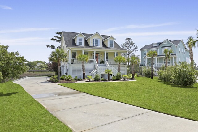 1216 Rivers Reach Dr, Charleston, SC 29492 - view of front of property with covered porch, stairs, a front lawn, and driveway