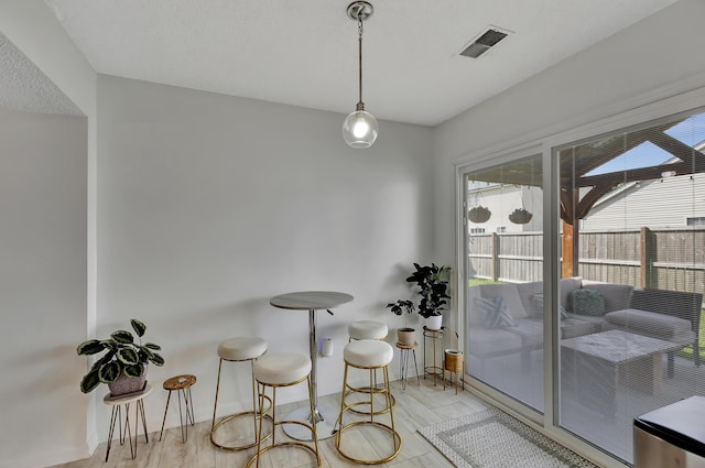 7838 Long Shadow Ln, North Charleston, SC 29406 - dining space with baseboards and light wood finished floors