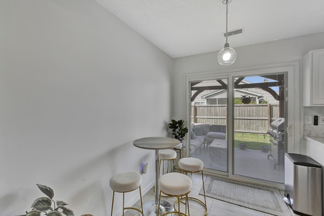7838 Long Shadow Ln, North Charleston, SC 29406 - dining room featuring baseboards and light tile patterned flooring