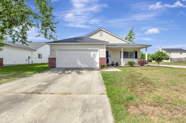 7838 Long Shadow Ln, North Charleston, SC 29406 - single story home featuring brick siding, a porch, a garage, and a front lawn