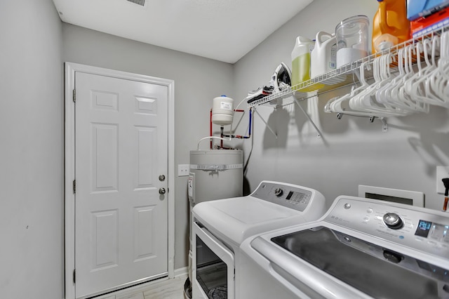 7838 Long Shadow Ln, North Charleston, SC 29406 - laundry room with separate washer and dryer and water heater