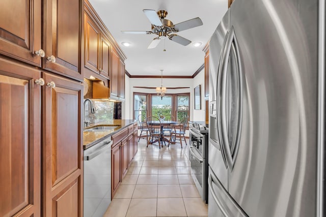 kitchen with light tile patterned floors, stainless steel appliances, tasteful backsplash, ornamental molding, and dark stone counters