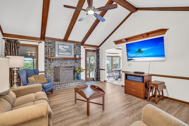 living room featuring baseboards, wood finished floors, beamed ceiling, a brick fireplace, and high vaulted ceiling