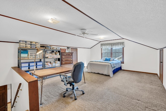 carpeted bedroom with lofted ceiling, baseboards, a textured ceiling, and ornamental molding