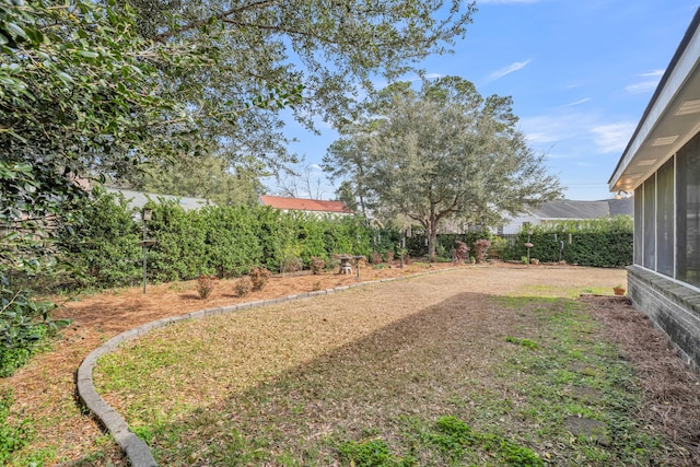 view of yard featuring a fenced backyard