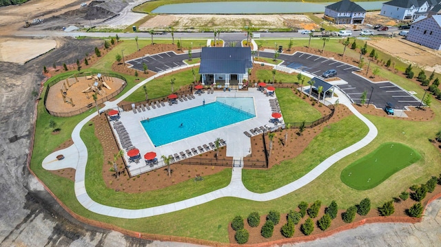 drone / aerial view of a pool