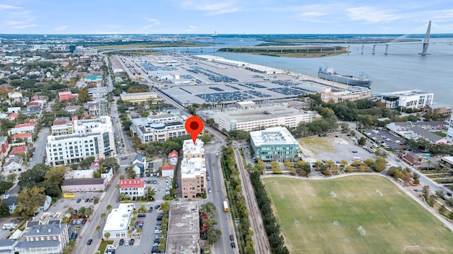 birds eye view of property with a water view