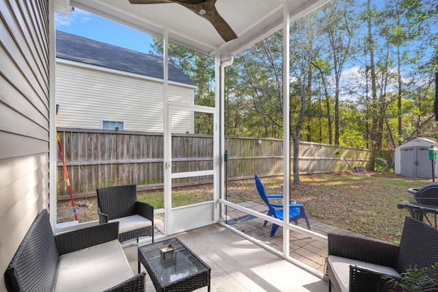 sunroom / solarium featuring ceiling fan