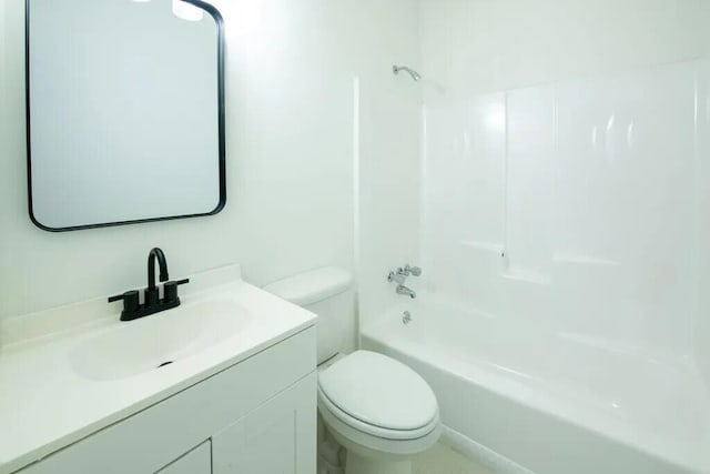 full bathroom featuring vanity, toilet, and washtub / shower combination