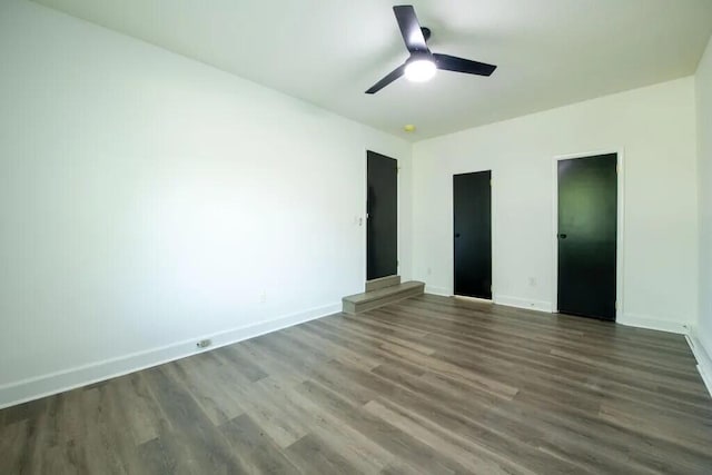 unfurnished bedroom featuring ceiling fan and wood-type flooring