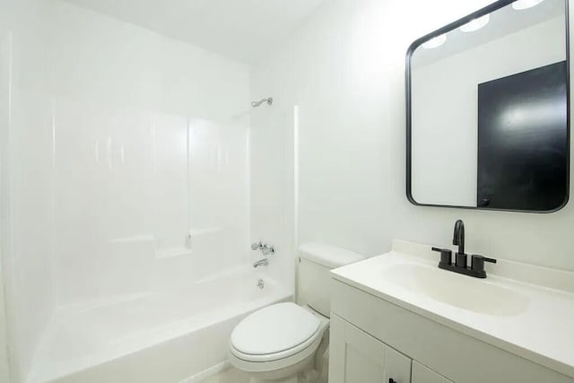 full bathroom with toilet, vanity, and bathing tub / shower combination