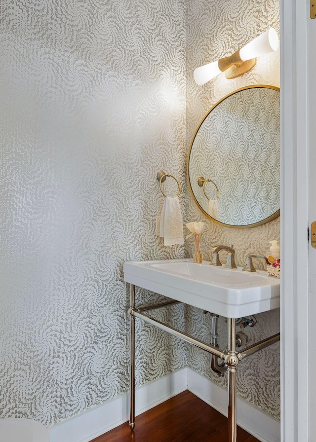 bathroom with wood-type flooring