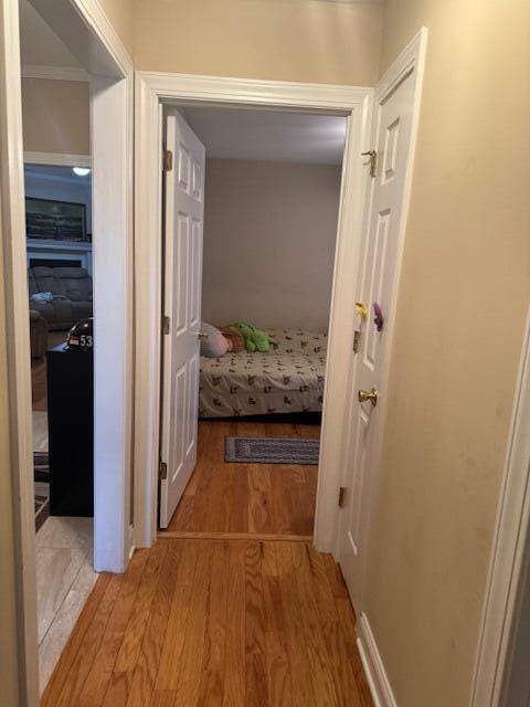 corridor featuring light hardwood / wood-style flooring