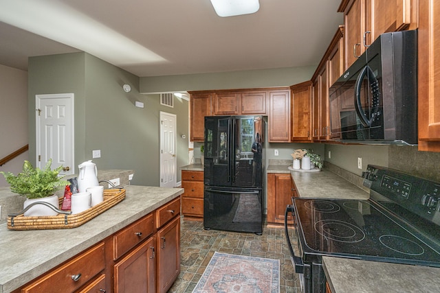 kitchen featuring black appliances