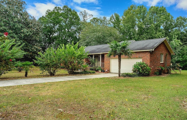 view of front of home with a garage and a front yard