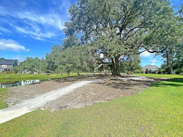 exterior space with a water view