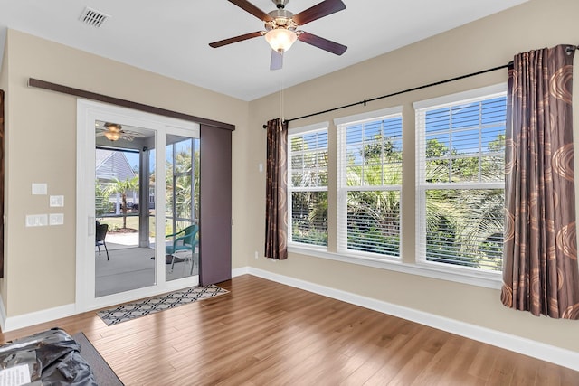 522 Tidewater Chase Ln, Summerville, SC 29486 - doorway to outside with baseboards, ceiling fan, and wood finished floors