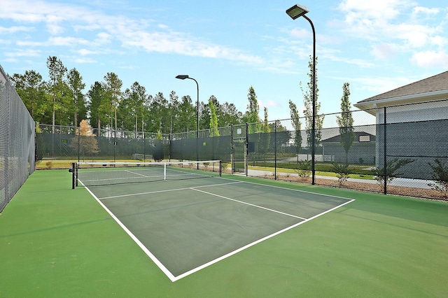 522 Tidewater Chase Ln, Summerville, SC 29486 - view of tennis court featuring fence and community basketball court