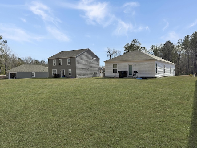 386 Spruce Ivy St, Moncks Corner, SC 29461 - back of house with a lawn