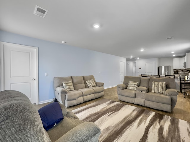 386 Spruce Ivy St, Moncks Corner, SC 29461 - living room with recessed lighting and light wood finished floors