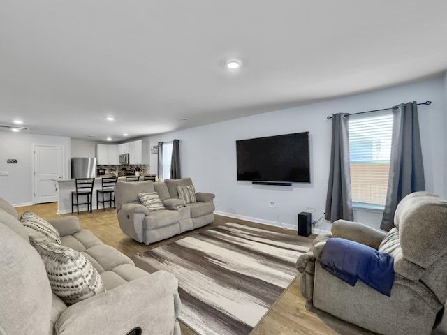 386 Spruce Ivy St, Moncks Corner, SC 29461 - living room with recessed lighting and light wood-style flooring
