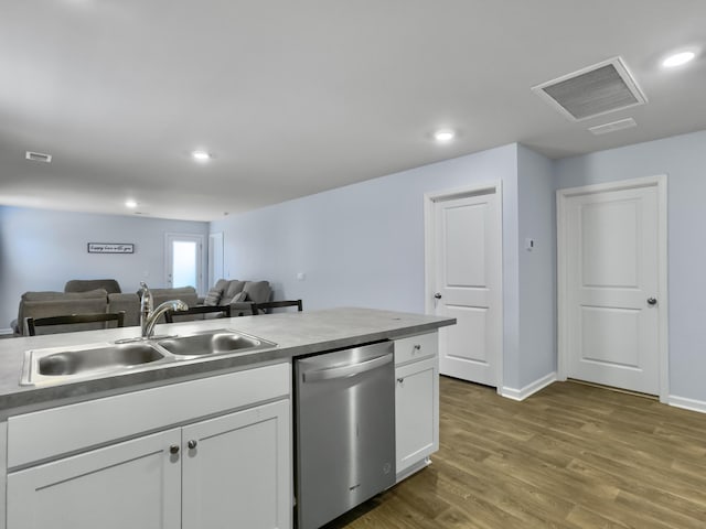 386 Spruce Ivy St, Moncks Corner, SC 29461 - kitchen featuring stainless steel dishwasher, open floor plan, white cabinetry, dark wood-style floors, and recessed lighting