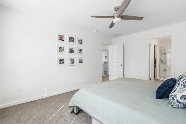 bedroom featuring carpet floors, ceiling fan, baseboards, and ensuite bathroom