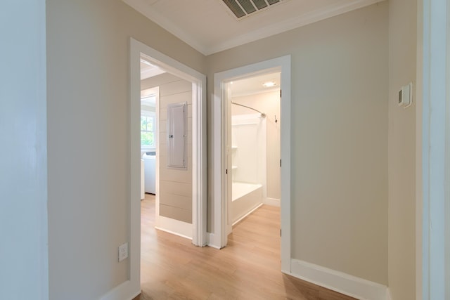 208 State St, Walterboro, SC 29488 - hallway with crown molding, baseboards, and light wood-style flooring